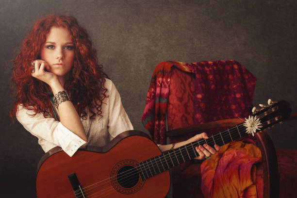 istock Girl with acoustic guitar 643271470