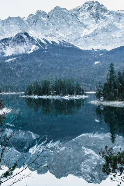 istock Winter landscape with lake and mountains, Zugspitze, Eibsee, Germany 643273026
