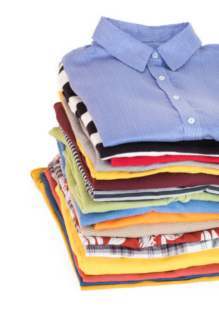 istock Stack of clothing isolated on white background 643275888