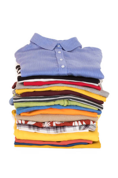 istock Stack of clothing isolated on white background 643275894