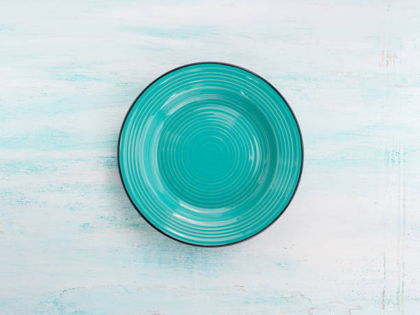 istock Pastel Color ceramic plate dish top view background 643296446