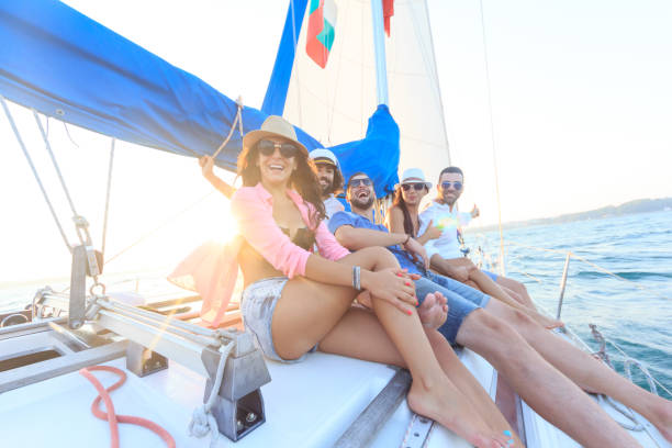 istock Young people having fun and sailing in sea 643297992