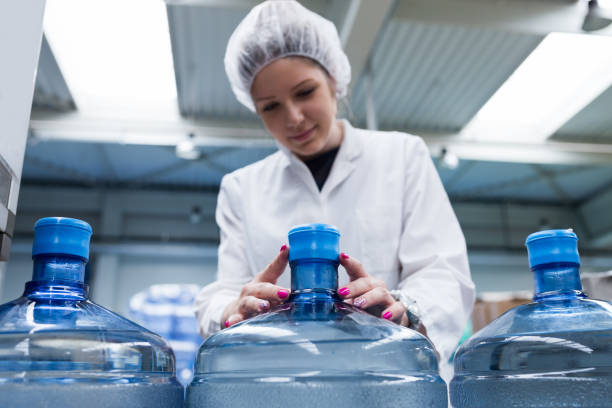istock Water bottling factory interiors and machinery. 643300698