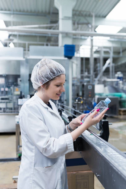 istock Water bottling factory interiors and machinery. 643301108