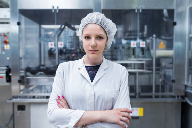 istock Water bottling factory interiors and machinery. 643305258
