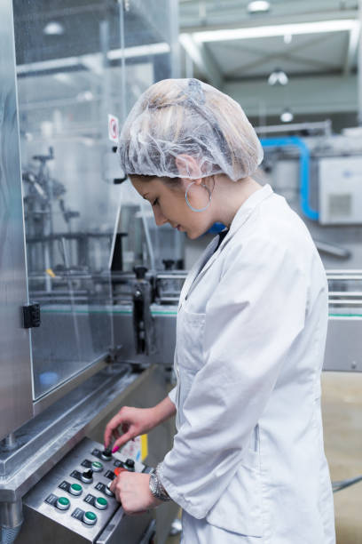 istock Water bottling factory interiors and machinery. 643305280