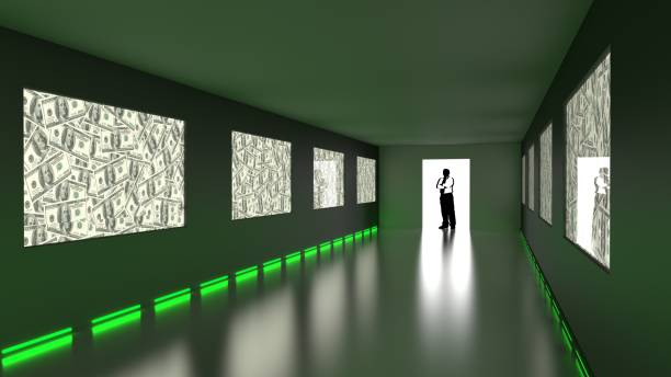 istock Businessman enters dark room with green dollar screens 643307188