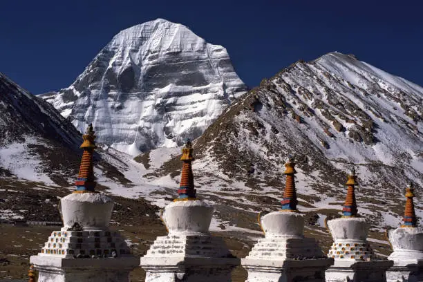 Buddhist ritual structures Stupas at the North Face of sacred Mount Kailash in Western Tibet.