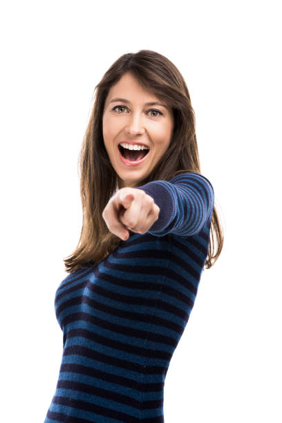 istock Beautiful woman pointing to the camera 643317872