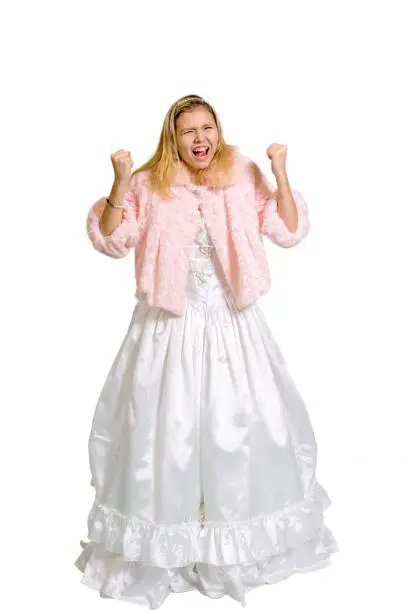 Screaming blonde fourteen year old in ballroom gown and jacket