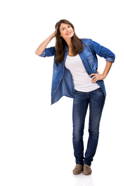 istock Beautiful woman standing over a white background with copyspace for the designer 643329654