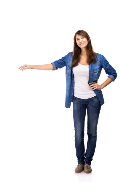 istock Beautiful woman standing over a white background with copyspace for the designer 643329662