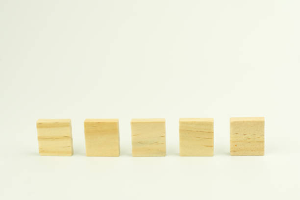 istock Row of five blank wooden blocks on a white background 643342168