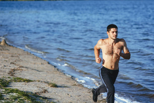 istock young attractive guy trains in the morning. 643342938
