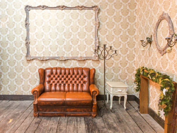 istock Brown leather couch at sitting room of studio  lviv ukraine 643346204
