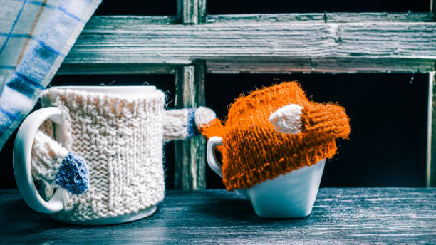 istock Mug in sweater attiring mall cup 643349334
