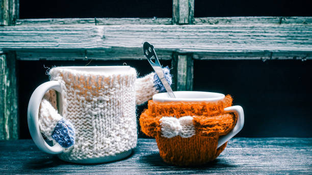 istock Family of mugs in sweaters 643350346