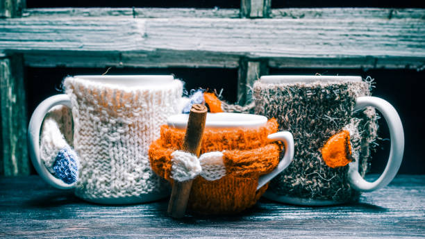istock Family of mugs in sweaters 643350426