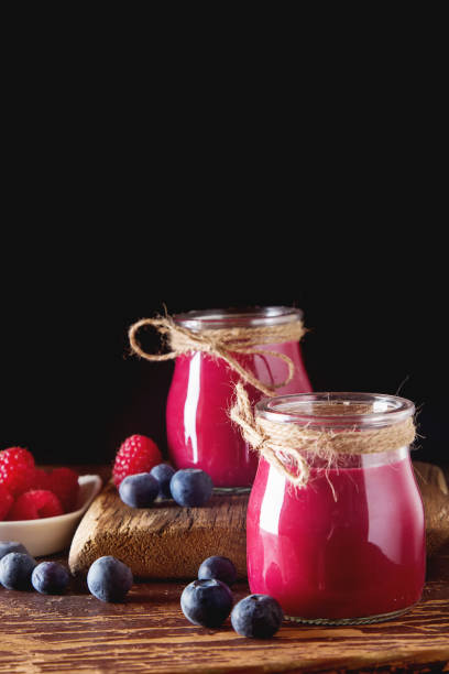 istock Fresh homemade smoothie with berries. Dark background. 643351010