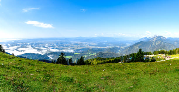Slovenia scenic mountain landscape shot at Krvavec Slovenia scenic mountain landscape shot at Krvavec mountain. Beautiful mountain landscape, with valley clouds and smaller mountain peaks. krvavec stock pictures, royalty-free photos & images