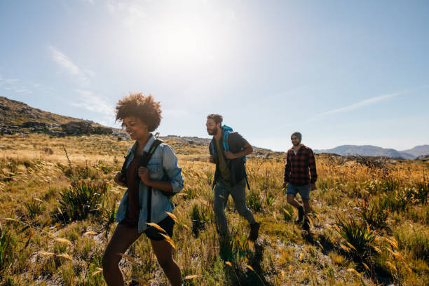 istock Group of people on walk through countryside 643361558