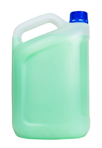 istock side view of plastic jerrycan with green liquid 643361672