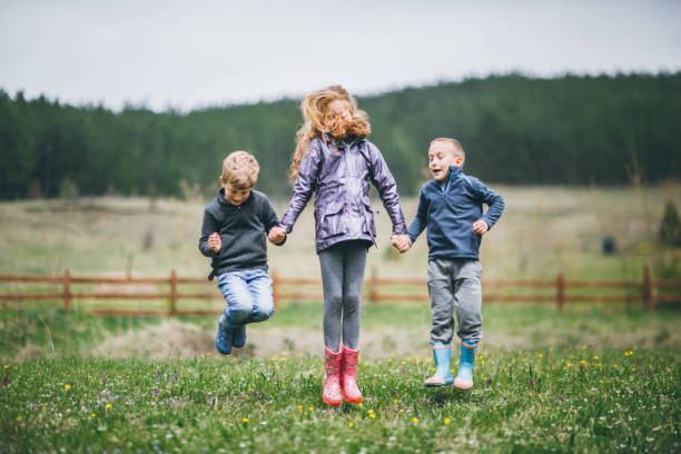 istock Kids having fun in the village. 643368406