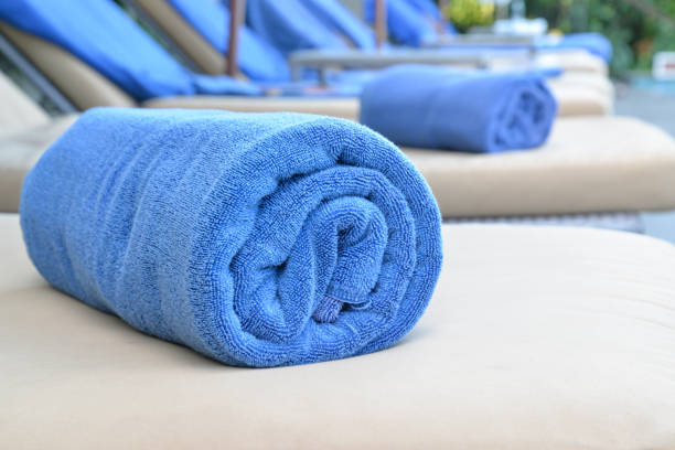 istock Blue towel on sun lounges. 643368580