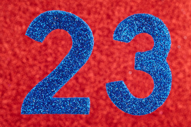 istock Number twenty-three blue over a red background. Anniversary. 643375550