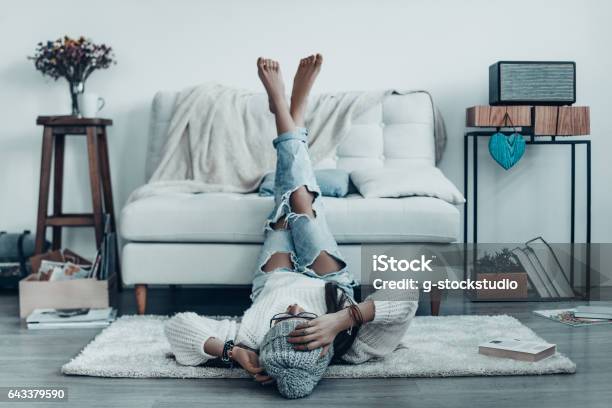 Spending Carefree Time Stock Photo - Download Image Now - Feet Up, Teenager, Sofa