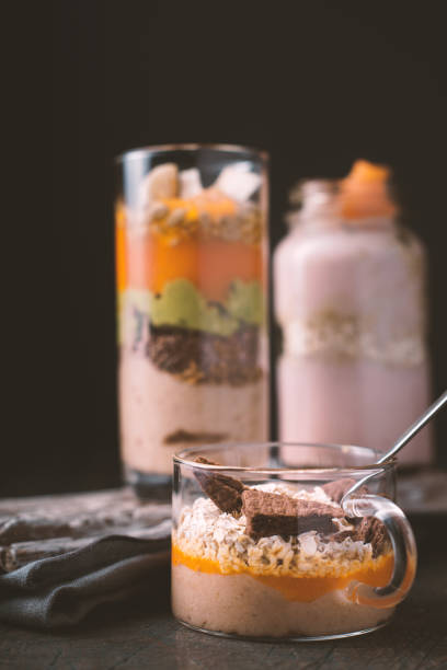 istock Smoothies pumpkin, avocado, blueberries on a black background 643402316