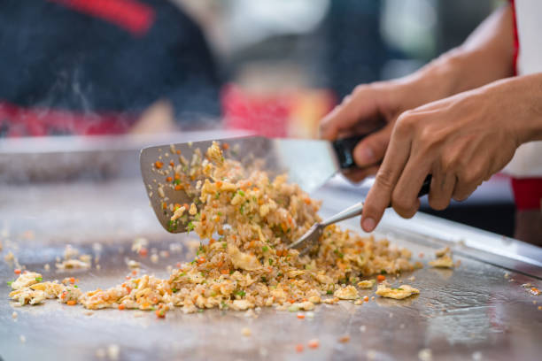 istock chef cooking homemade spicy fried rice 643416094