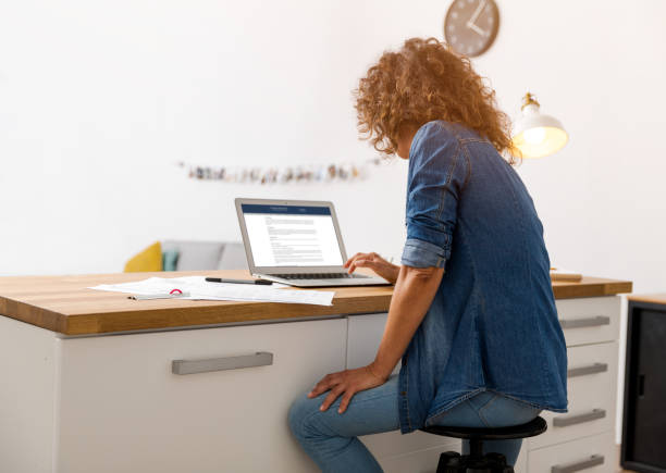 istock Woman working at the office 643424750