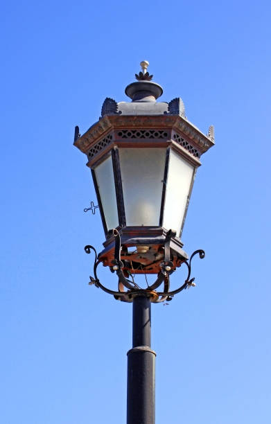 istock Old street lamp against sky 643431380