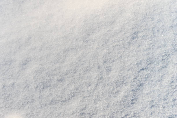 istock Snow texture at sunny winter day. Abstract background. 643438678