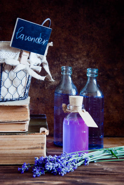 istock Lavender flowers, lavender essential and old books 643443342
