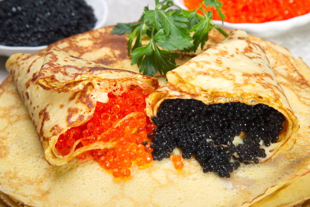 Pancakes with red and black caviar.