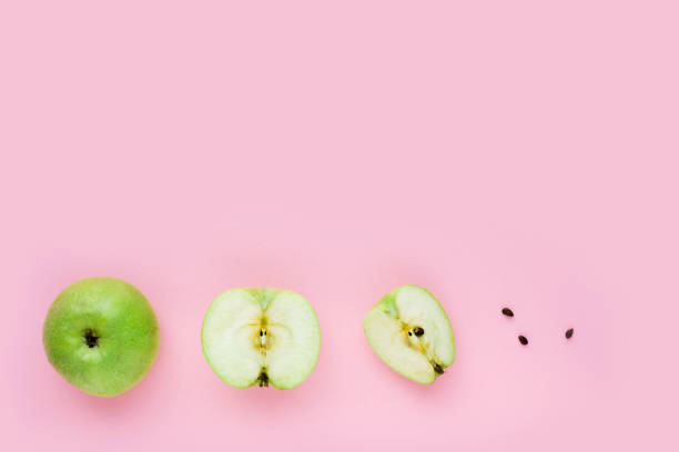 istock Green apple, half apple and quarter apple 643447386