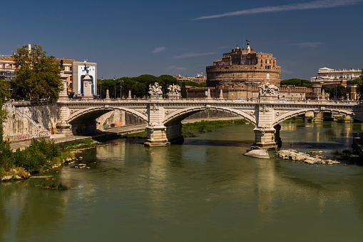 ROME – AUGUST 29: Ponte Vittorio Emanuele II bridge over River Tiber, Castel Sant Angelo on the background on August 29, 2016 in Rome