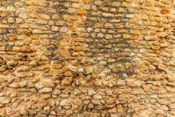 istock Background of ancient  stone wall. Texture of old brick. 643453892