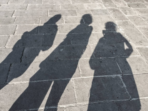 istock shadows of people on movement 643457460