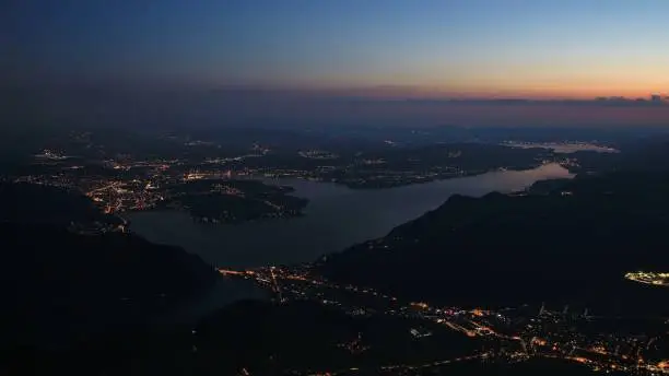 Lucerne and lake Vierwaldstattersee by night. View from mount Stanserhorn.