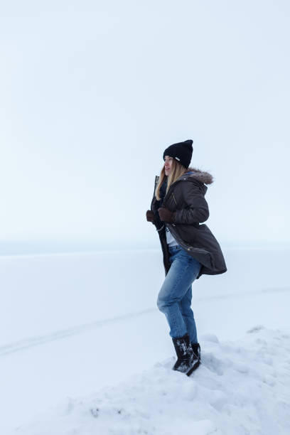 Girl on a background of a white field