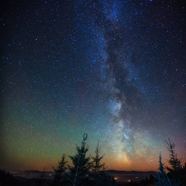 istock fantastic winter meteor shower and the snow-capped mountains. 643499064