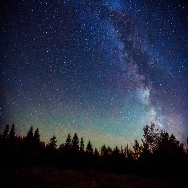 istock fantastic winter meteor shower and the snow-capped mountains. 643499442