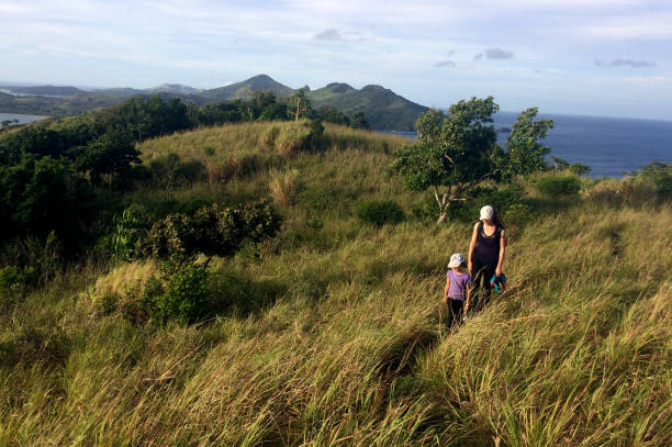 istock Mother and daughter hiking together 643503412