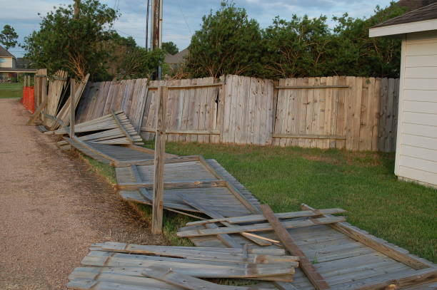 istock Hurricane damaged fence 643516678