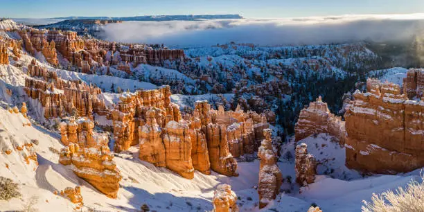 Panoramic image of Bryce Canyon hoodoos covered in snow taken from Sunset Point in Bryce Canyon National Park, Utah (Panorama)