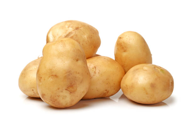 istock Cluster of brown potatoes on white background 643531454