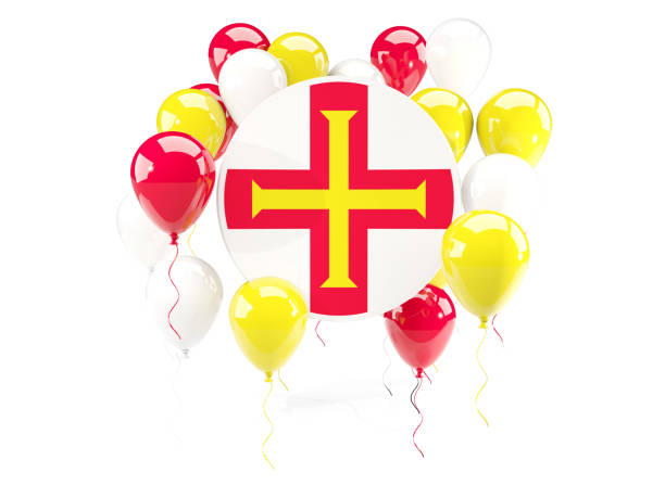 istock Round flag of guernsey with balloons 643533868